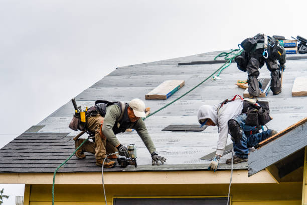 Professional Gutter Installation technician working in Winfred, SD